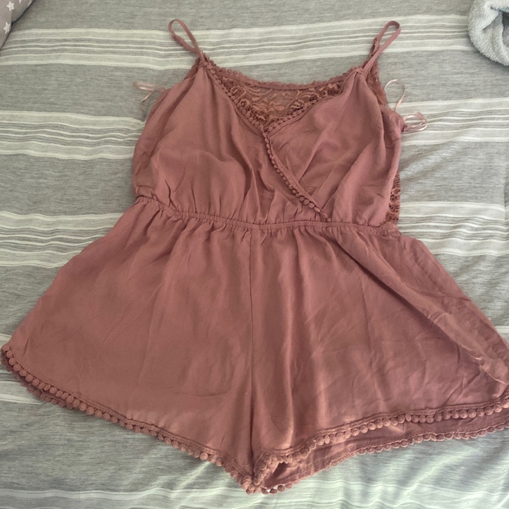 Woman’s romper, lightly used